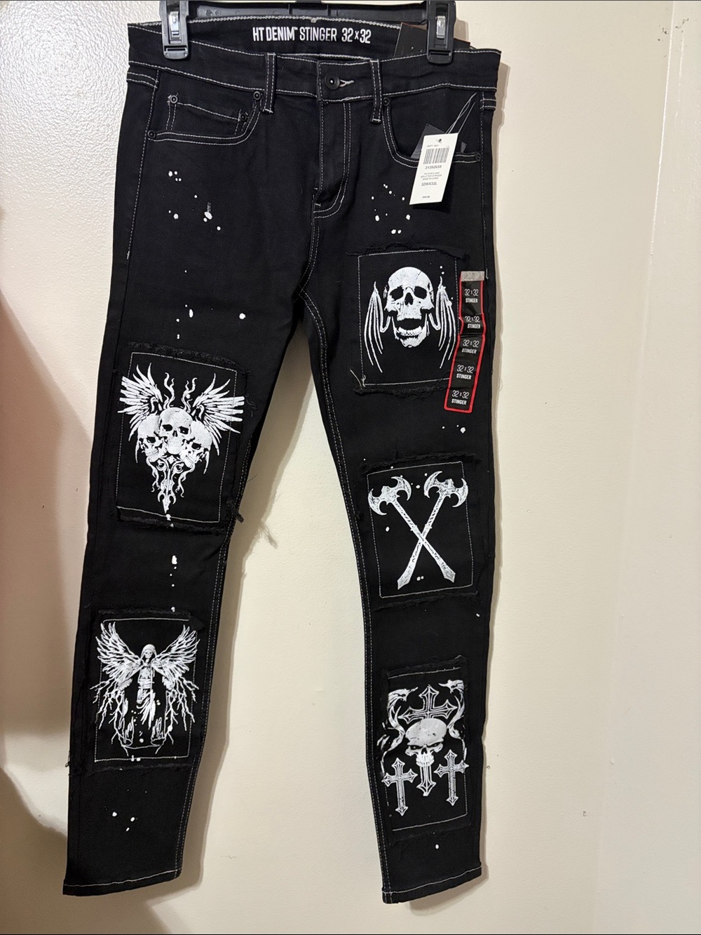 Hot Topic Black Stinger Skinny Jeans with White Skull Patches